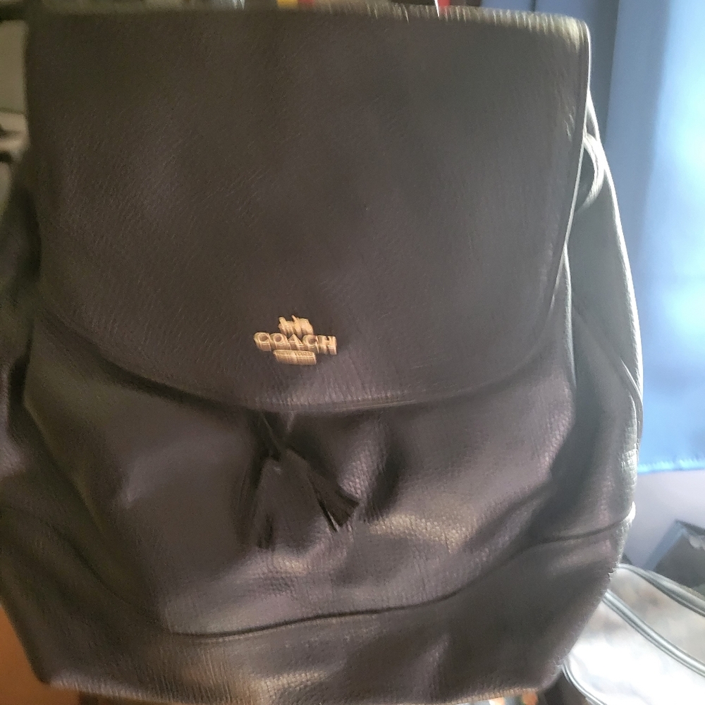 Coach pebbled black leather drawstring backpack